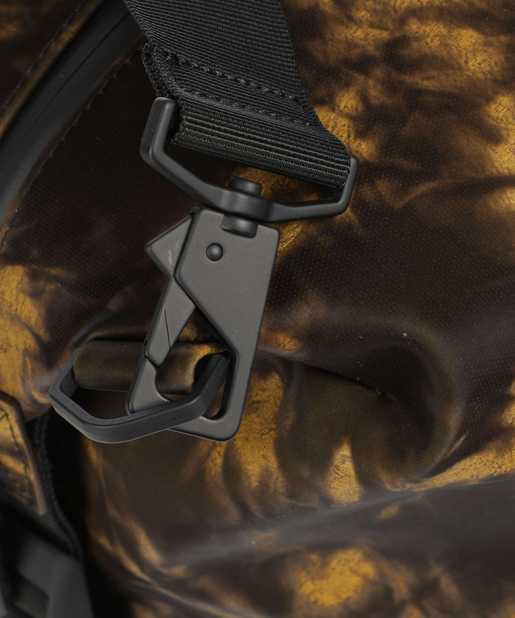 Rains Hilo Weekend bag muddy